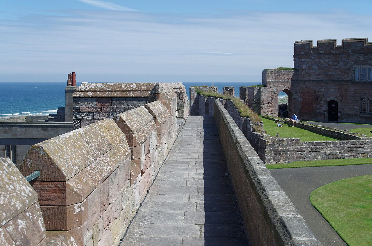 Bamburgh Castle on its rock above the village