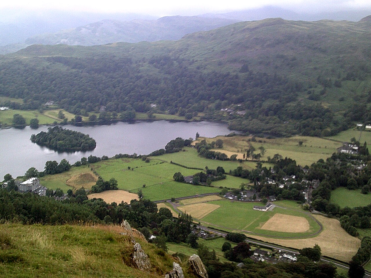 Grasmere village and its lake among the fells