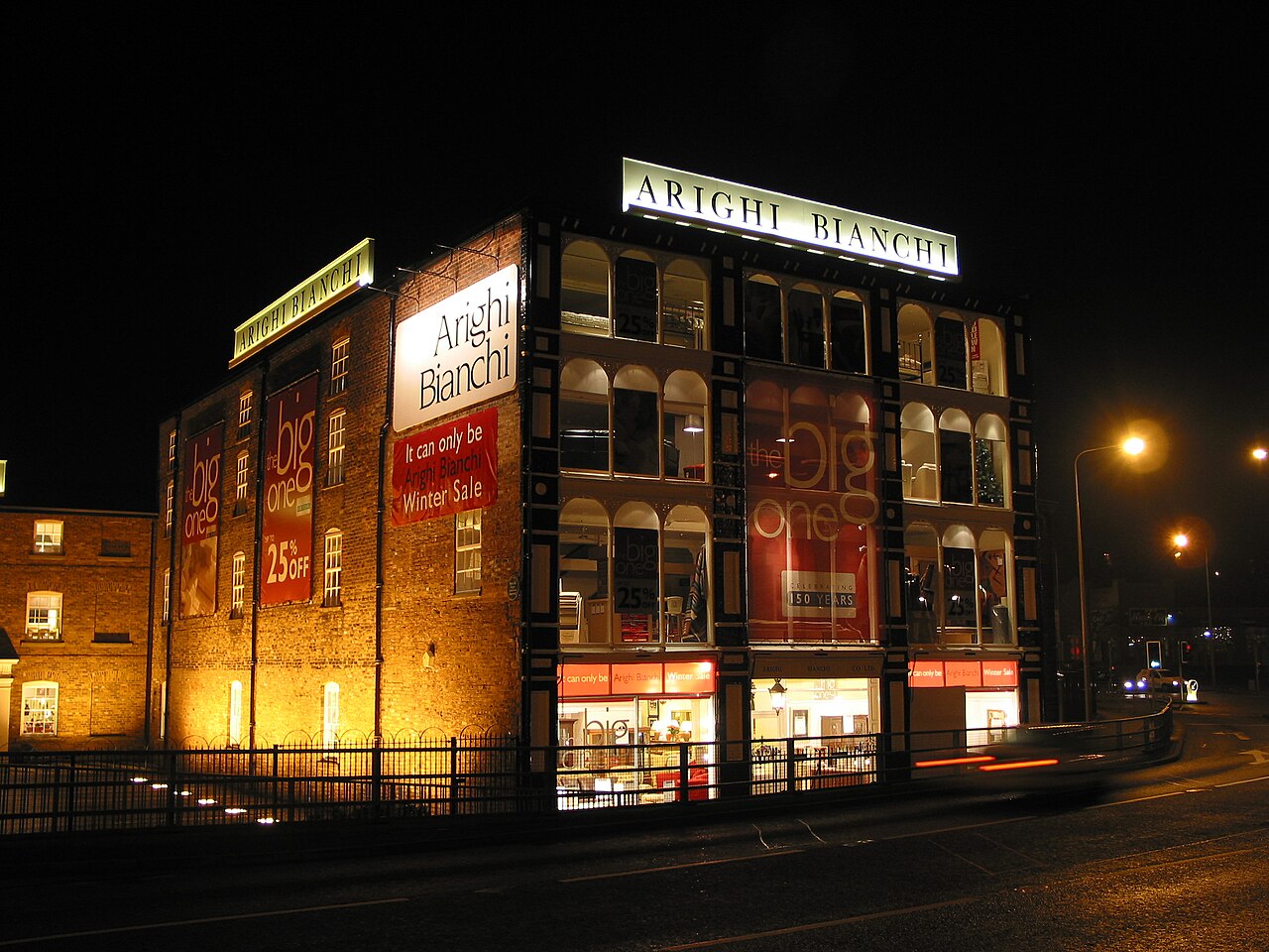 The Arighi Bianchi furniture store in Macclesfield, lit up at night