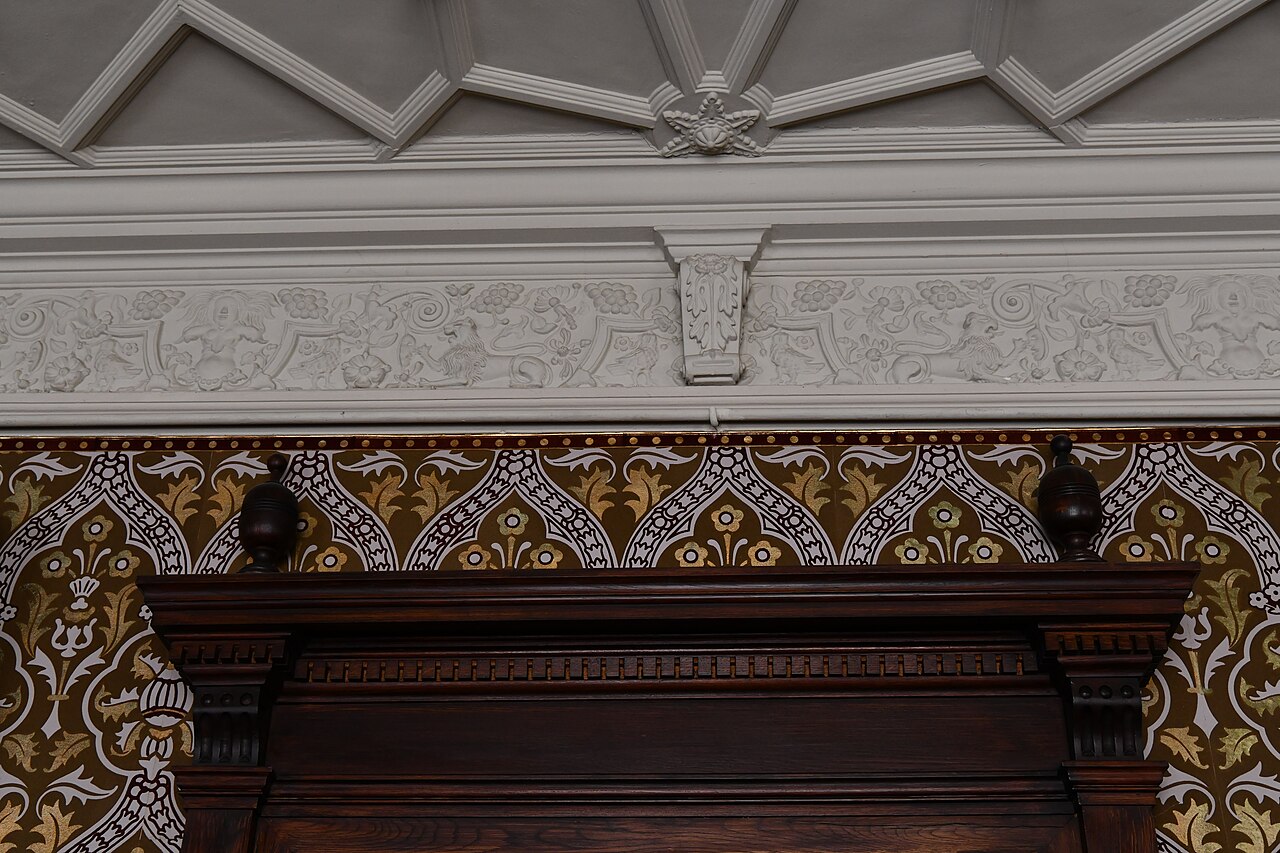 Plasterwork of 1603 above a wallpaper made to Pugin's design at Gawthorpe Hall, Lancashire