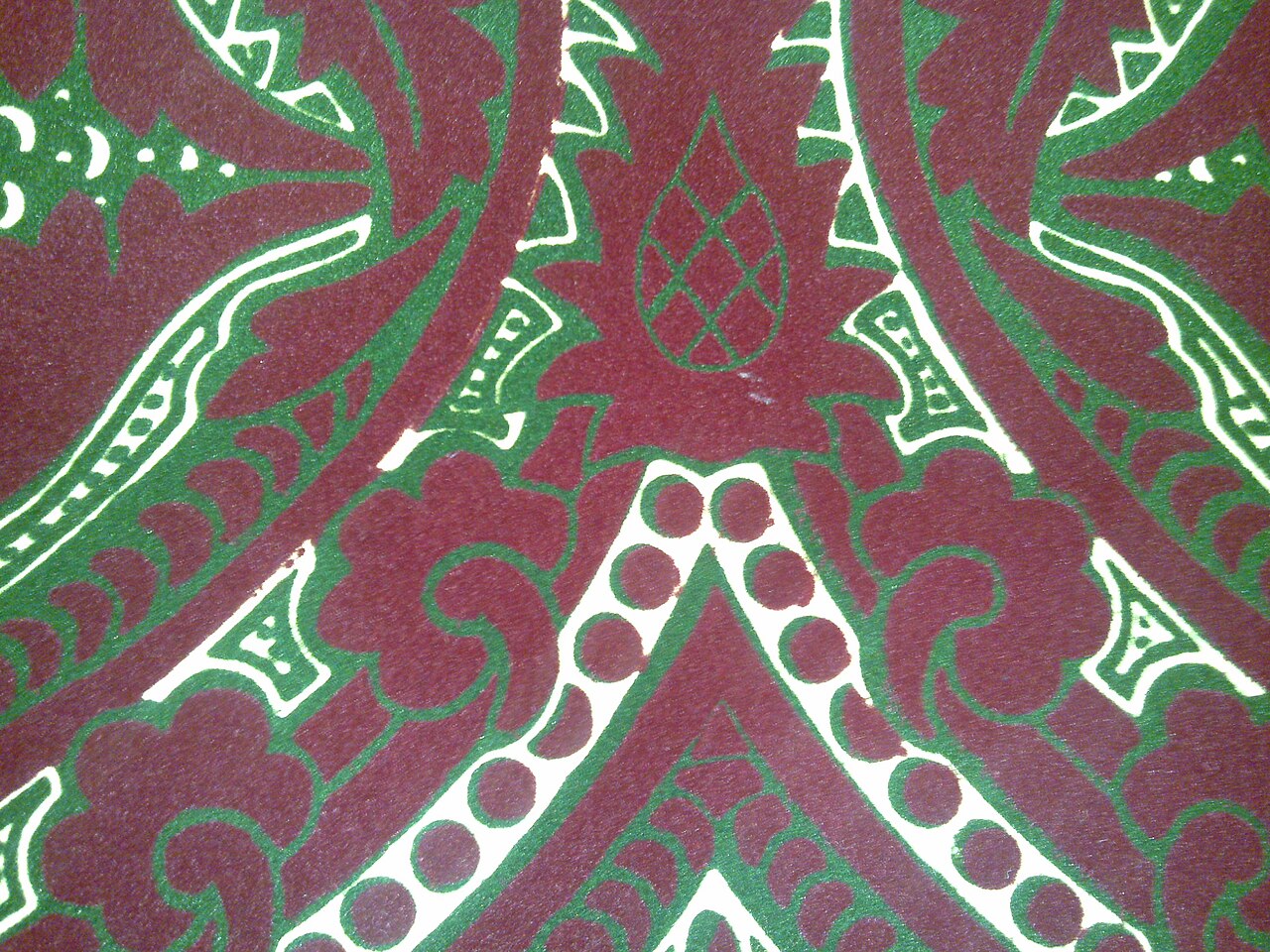 A Gothic Revival wallpaper in deep red and green at the Palace of Westminster